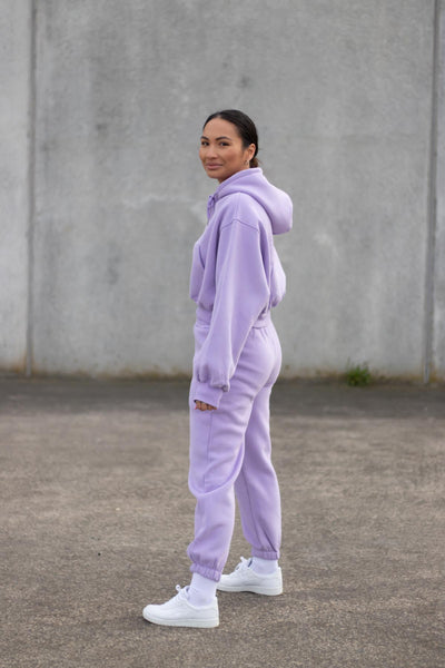 woman wearing loungewear hoodie and joggers in lavender