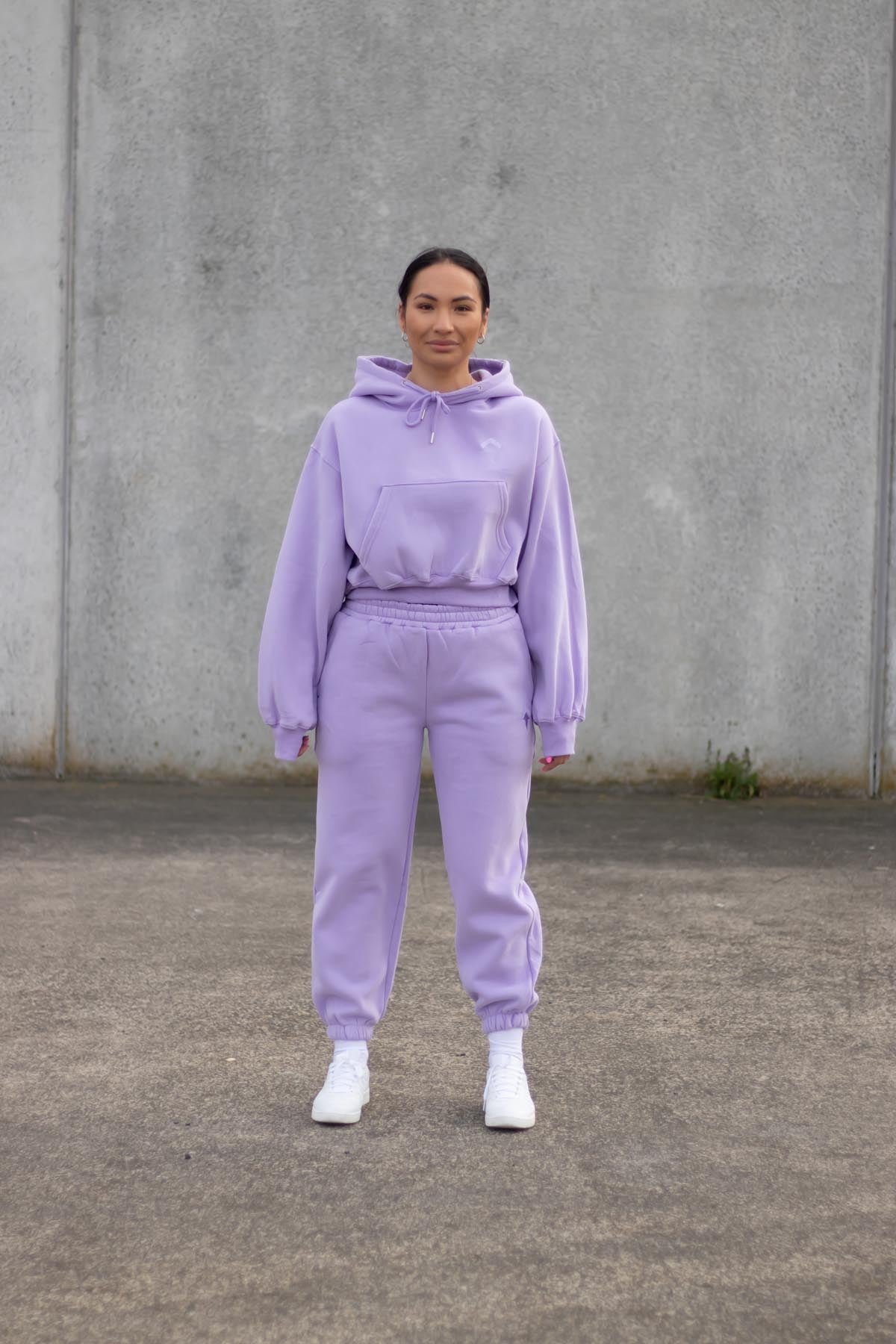 woman wearing loungewear hoodie and joggers in lavender